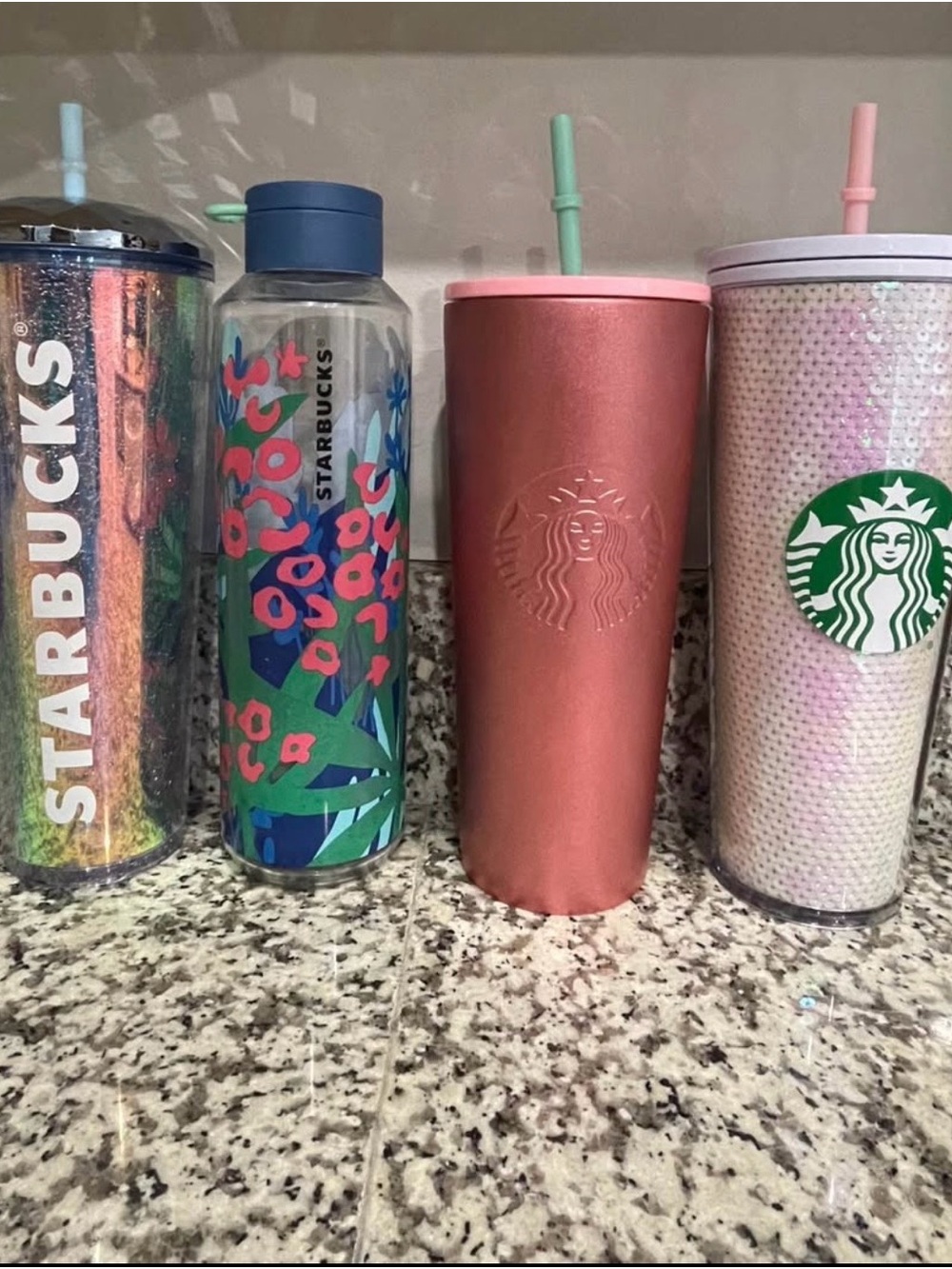 Starbucks cups and bottle